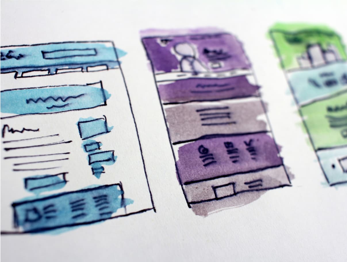 three different color websites wireframes